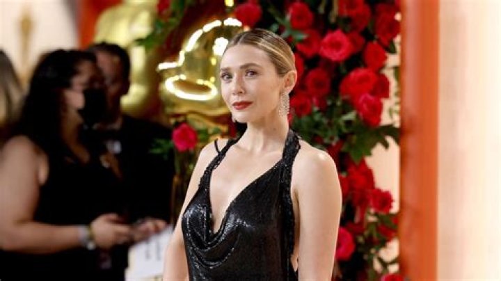 Elizabeth Olsen: Fiancée, net worth, tattoos, smoking & body measurements